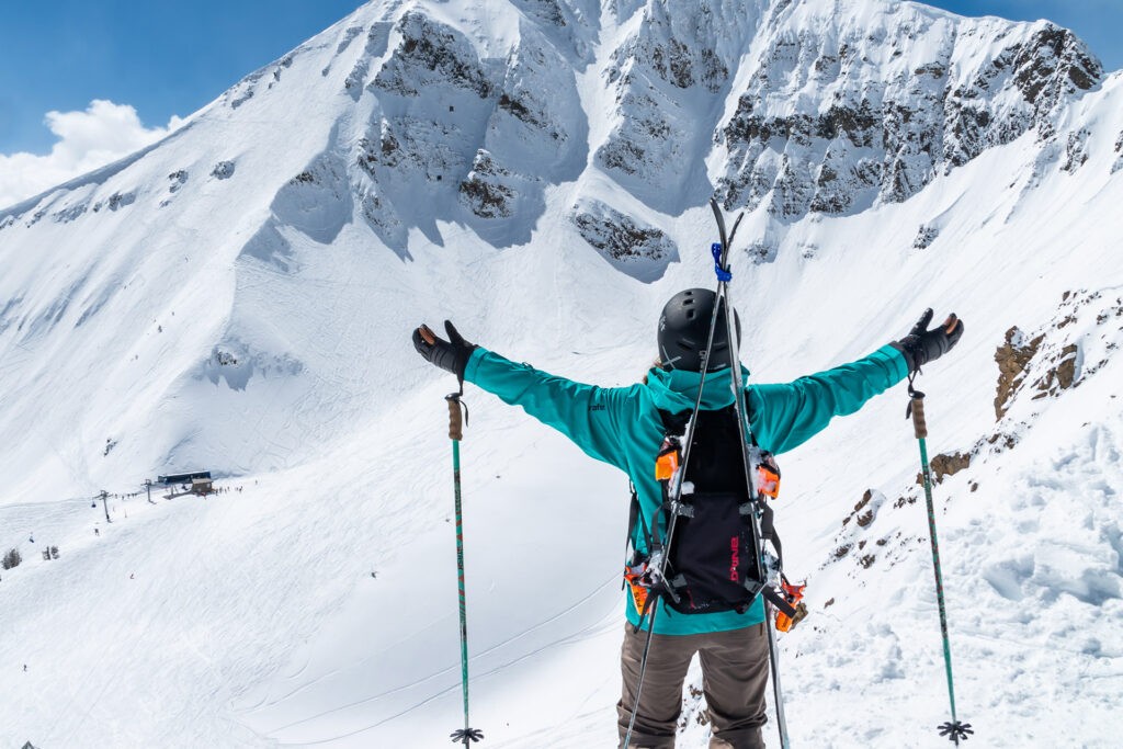 Skier with arms outstretched at Big Sky Resort