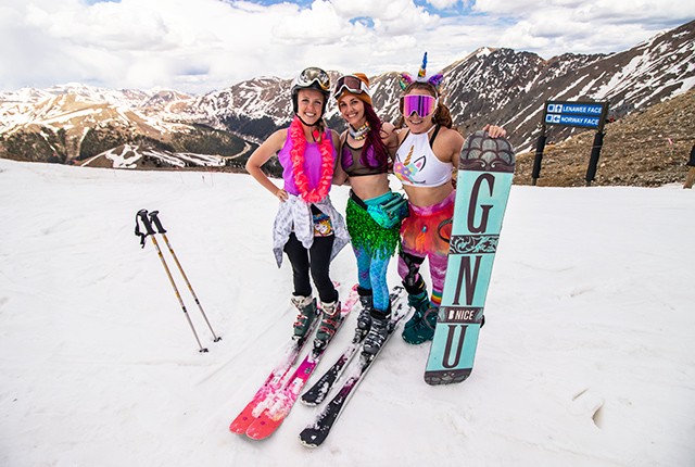 The Beach at Arapahoe Basin spring skiing women in costume.