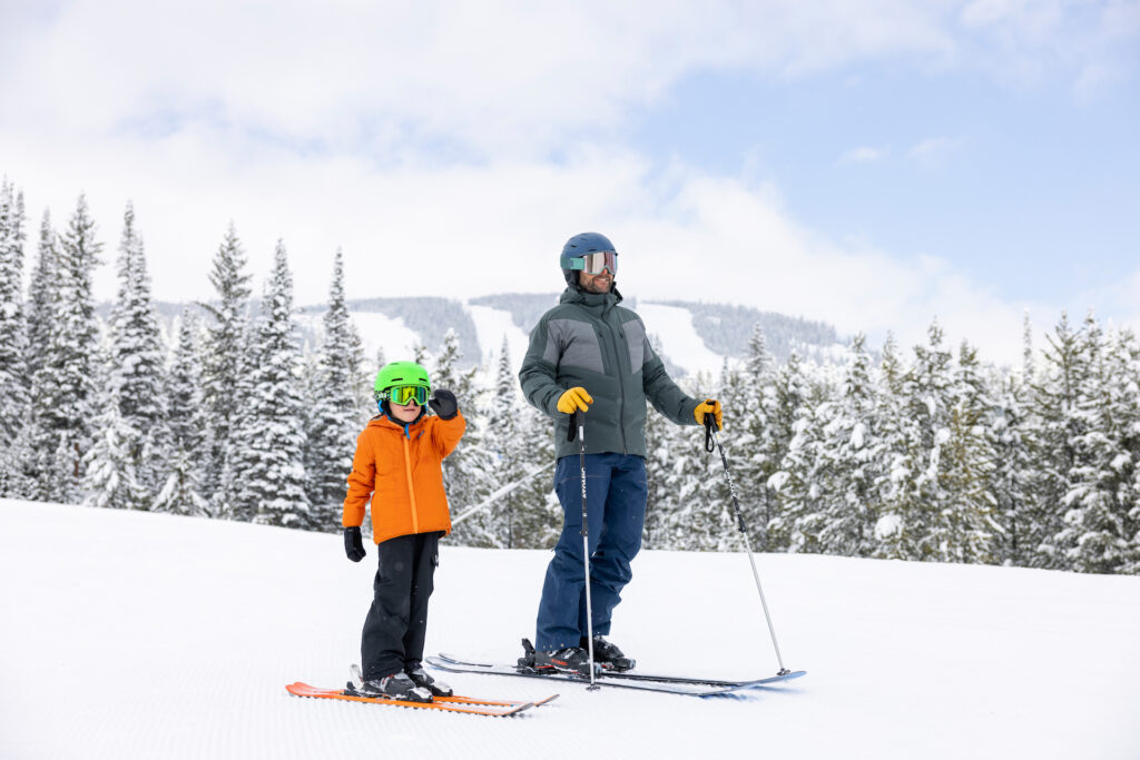 Father and son taking a break while skiing at Montage Deer Valley