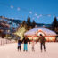 Family ice skating at dusk in Aspen