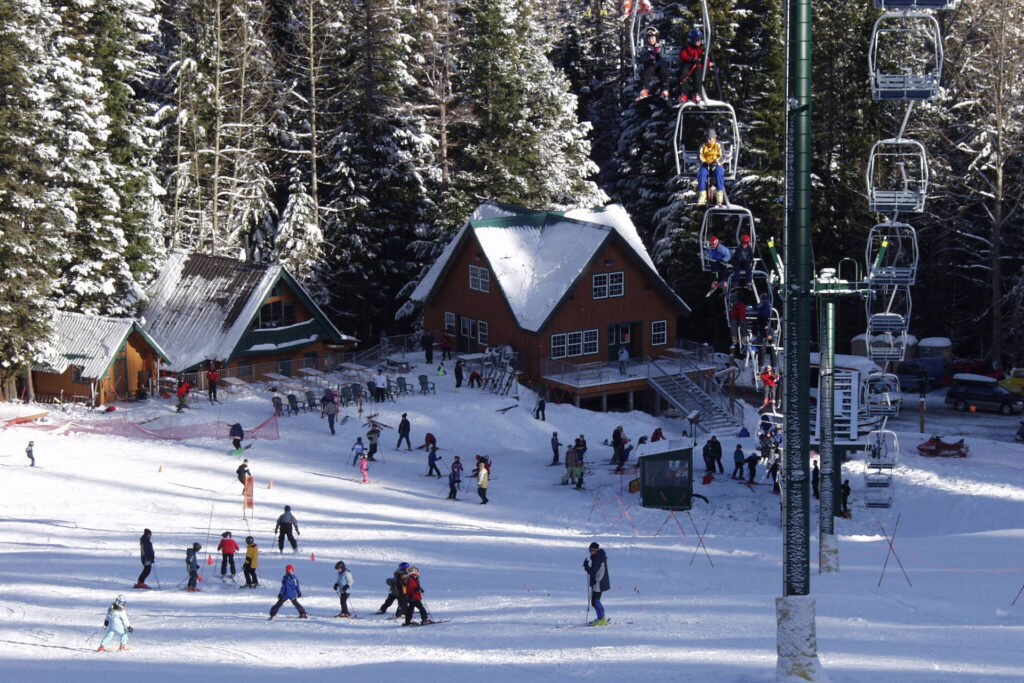 The base of Cooper Spur Mountain Resort on a sunny winter day