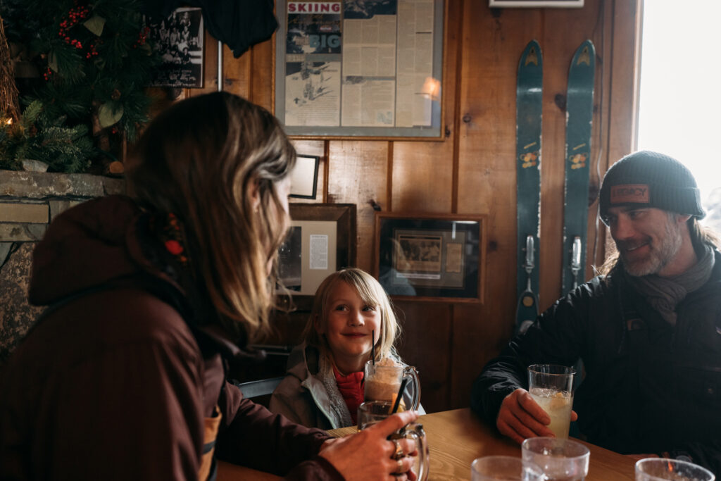 Family having drinks together inside a bar in Montana