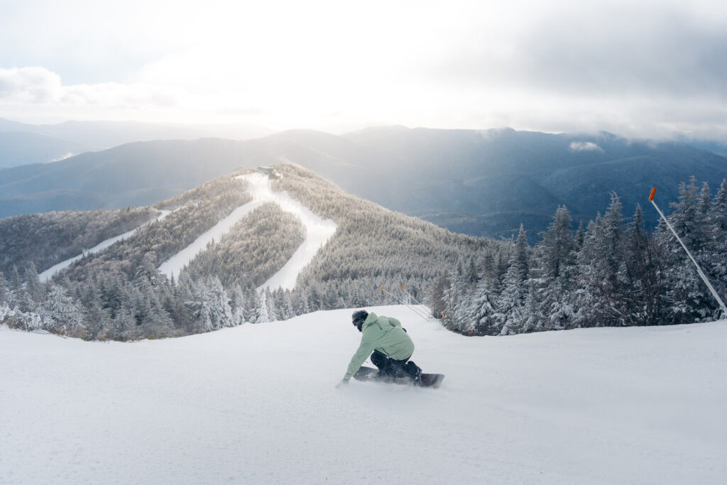 Snowboarding down slopes of Whiteface on a powder day