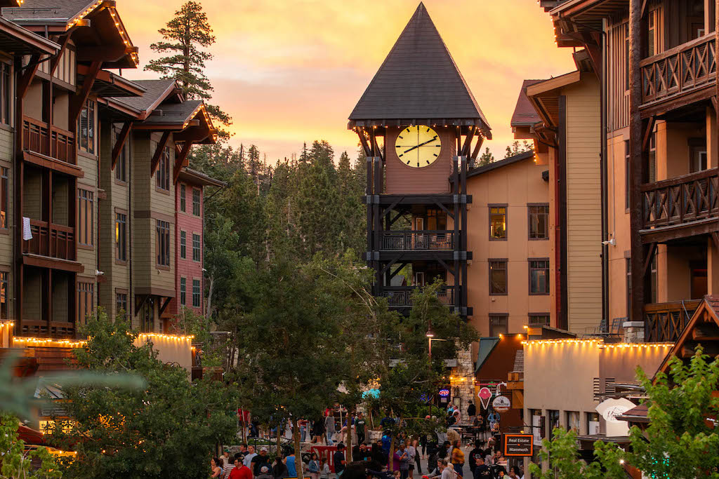 People walking through the Village at Mammoth at sunset