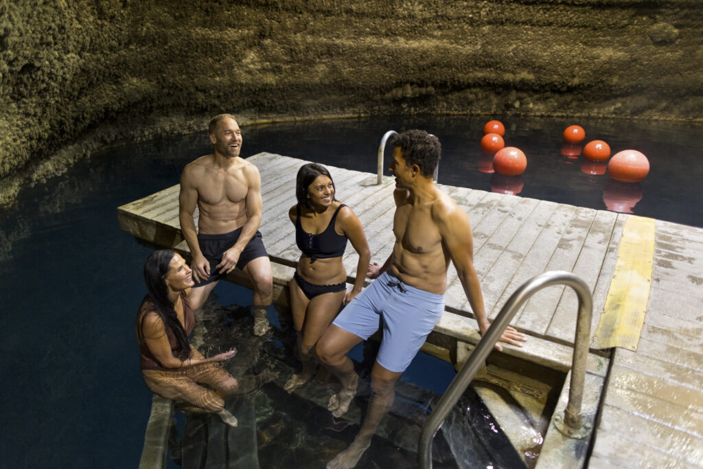 Group of friends relaxing together at the Homestead Crater