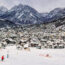 People skiing slopes toward the town of Bormio Italy