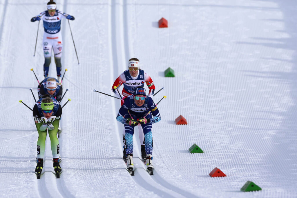 Cross-country skiers racing on cross-country track during World Cup Race