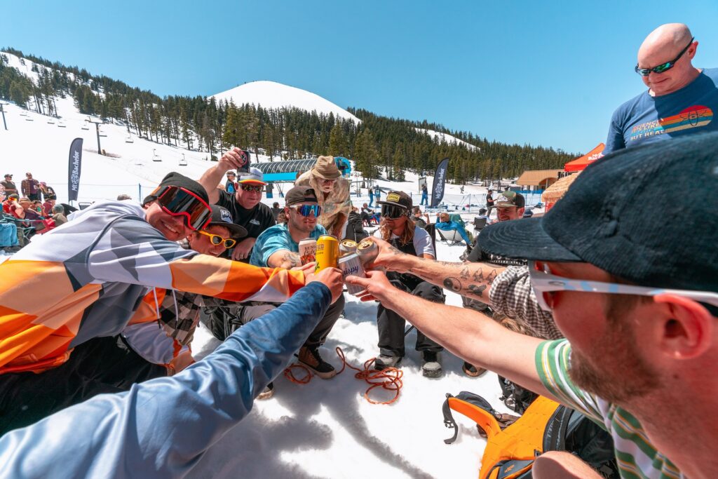 Group of friends toasting cans