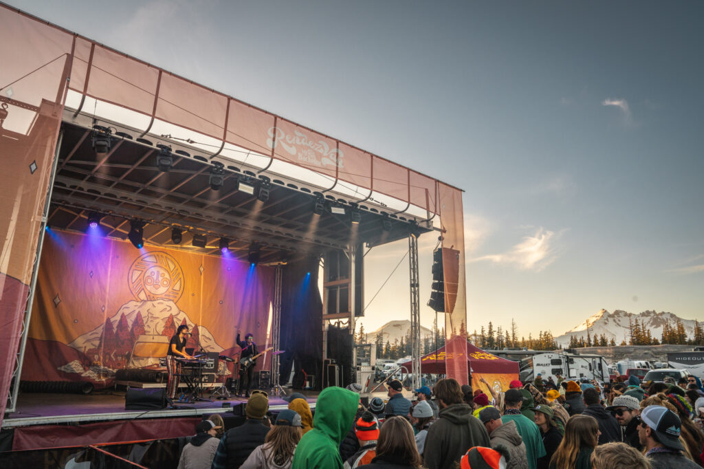 Musicians playing on stage at festival at Mt. Bachelor